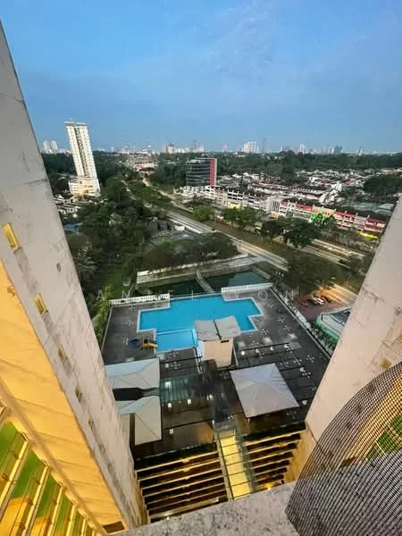Exterior type: high-rise condominium; features: infinity pool, pool deck with loungers, surrounded by greenery, city skyline in background, multiple outdoor pavilions, landscaped garden area; style: modern.