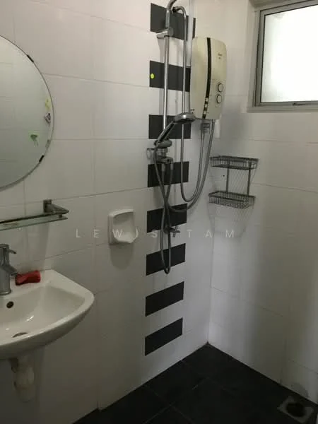 Bathroom features: white tiled walls, black accent tiles, black tile flooring, single-sink vanity, chrome basin mixer faucet, round mirror, shower with handheld showerhead, water heater, wall-mounted storage basket, toilet paper holder; style: modern.