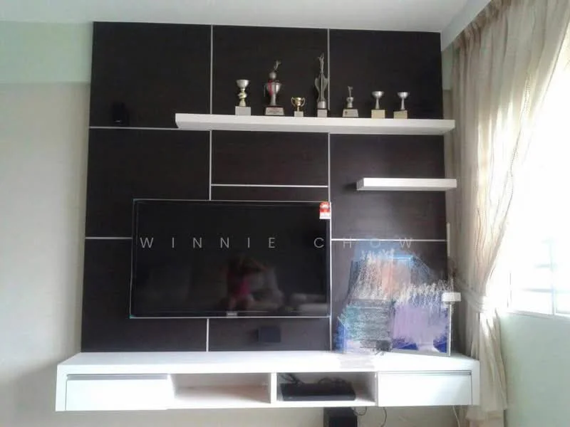 Living features: wall-mounted TV, dark wood feature wall, white floating shelves, trophies displayed on shelves, light-colored walls, curtains, built-in TV console, decorative artwork; style: modern.