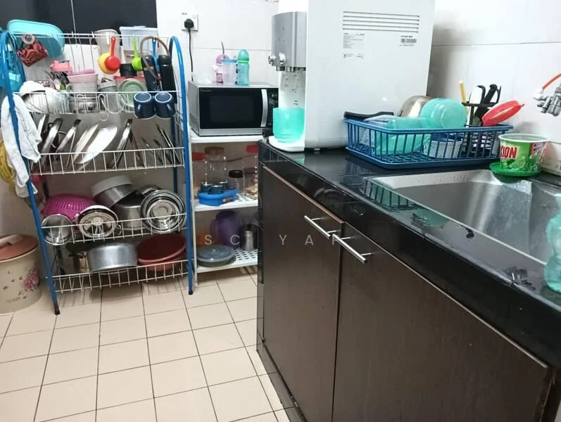 Kitchen features: black granite countertop, single-bowl stainless-steel sink, chrome pull-down faucet, wood cabinetry with dark finish, microwave, dish rack with various dishes, plastic containers, metal pots and pans, kitchen utensils, tile flooring, white tiled walls.
