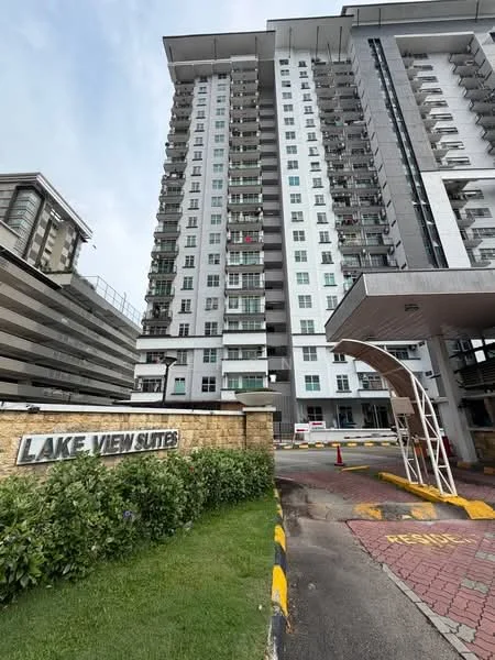 Exterior type: high-rise condominium; features: glass curtain wall, white painted facade, recessed balconies, approximately 20-storey high-rise, manicured lawn, landscape garden, main entrance gate with signage, covered entrance with awning; style: modern.