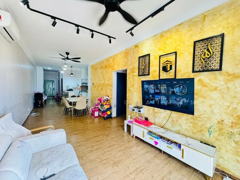 Living features: light wood laminate flooring, yellow textured accent wall, white painted walls, 5-blade ceiling fan, wall-mounted TV, white TV console, decorative wall art, sofa, children's play area with toys, dining area visible in background; style: modern.