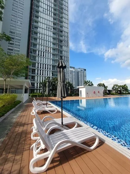 Exterior type: high-rise condominium; features: infinity pool, pool deck with loungers, umbrella shades, wooden decking, landscaped greenery, surrounding high-rise buildings, clear blue sky; style: modern.