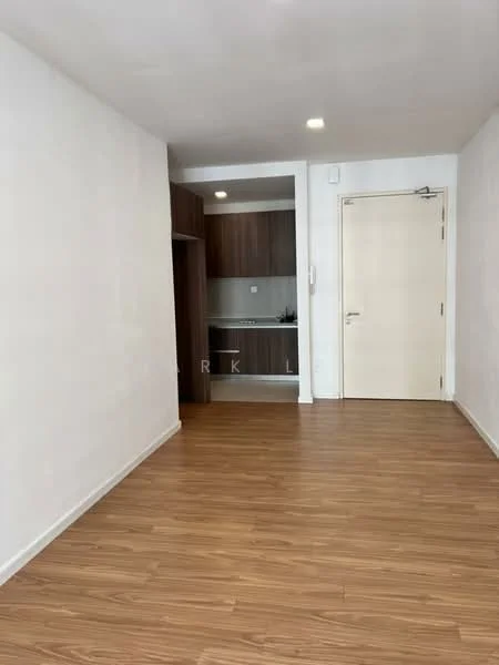 Living features: laminate flooring, white painted walls, recessed downlights, open layout, door leading to hallway, kitchen area visible, neutral color scheme; style: modern. Kitchen features: wood cabinetry, countertop, sink, kitchen appliances visible, back wall with backsplash; style: modern.