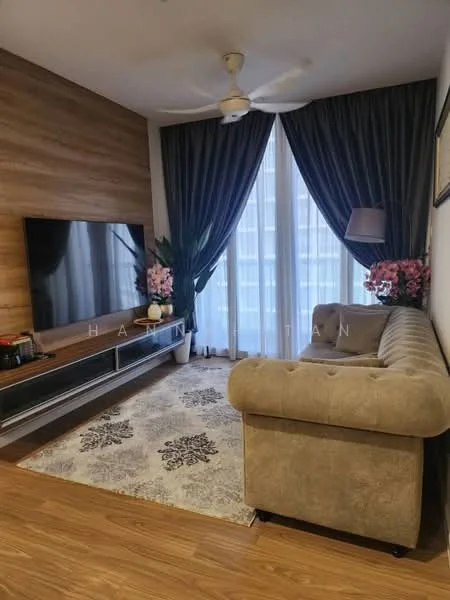 Living features: 3-seater fabric sofa in beige, wooden TV console, wall-mounted flat-screen TV, area rug with floral pattern, floor-to-ceiling windows, sheer curtains, dark grey drapes, decorative houseplants, wood panel accent wall, ceiling fan with light; style: modern.