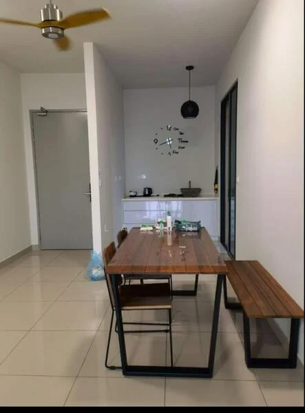 Dining features: wooden dining table with metal legs, 4 wooden chairs, pendant light fixture, 5-blade ceiling fan, white walls, tile flooring, clock on wall, kitchenette area visible, black countertop, kettle on countertop, sink in kitchenette; style: modern.
