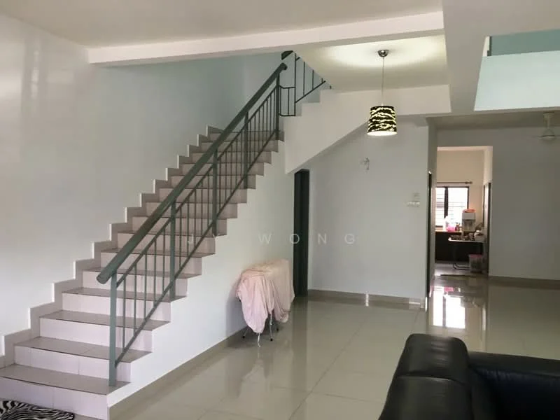 Room features: staircase with metal railing, white painted walls, glossy tile flooring, ceiling light fixture, open layout, corner of kitchen visible, living area with sofa, natural light from windows; style: modern.