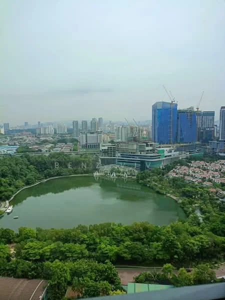 Exterior type: high-rise condominium; features: city skyline view, lake with greenery, surrounding high-rise buildings, lush landscaping, construction cranes visible, waterfront, manicured lawns; style: modern.