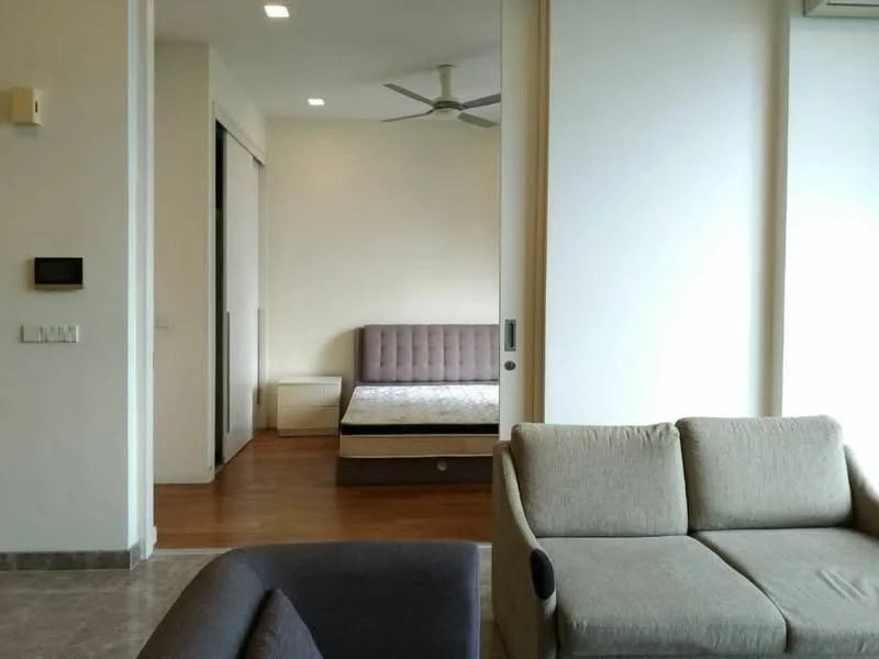 Living features: 3-seater fabric sofa in grey, ceiling fan, wall-mounted intercom panel, light switch, marble flooring, neutral painted walls, large window with natural light; style: modern. Bedroom features: queen-size bed, wood flooring, neutral painted walls, built-in wardrobe, nightstand, window with natural light; style: modern.