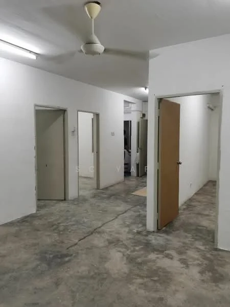 Room features: concrete flooring, white painted walls, ceiling fan, multiple doors, fluorescent lighting, open layout; style: minimalist.
