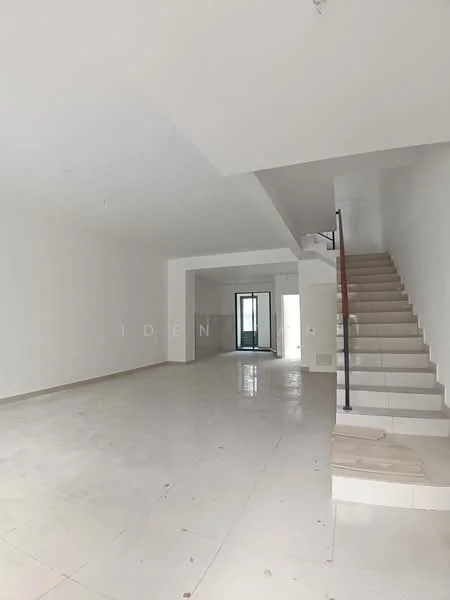 Room features: white painted walls, tile flooring, staircase with metal railing, large windows for natural light, open layout, high ceiling, neutral color scheme, no visible furniture; style: modern.