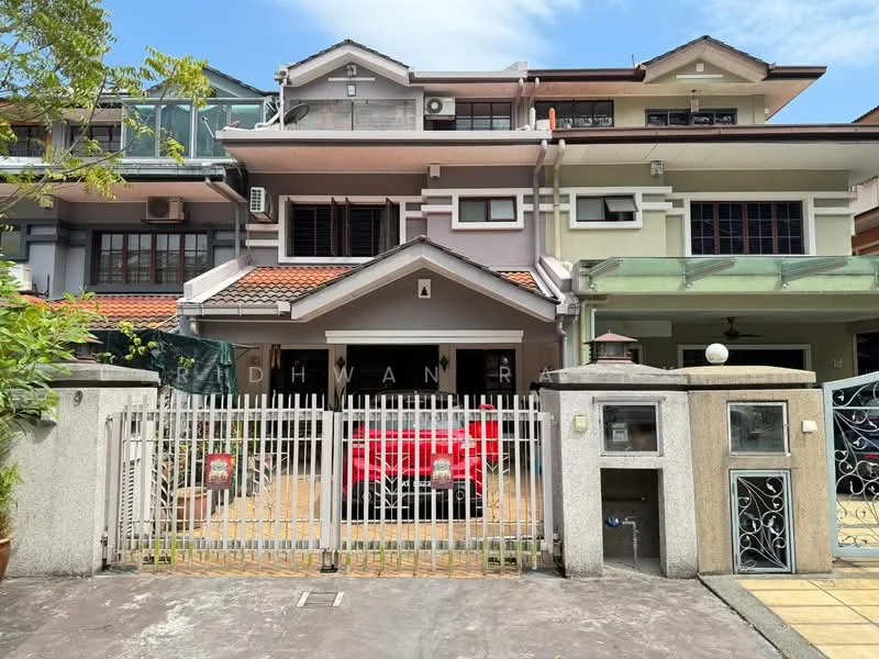 Exterior type: linked terrace house; features: two-storey building, red car parked in driveway, white painted facade, terracotta roof tiles, front gate with metal bars, paved driveway, manicured landscaping, balcony on upper floor, outdoor lighting fixtures, glass awning over entrance; style: modern.