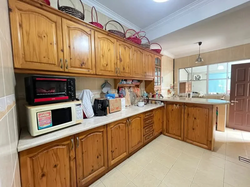 Kitchen features: wooden cabinetry, cream countertop, microwave, red microwave, stainless-steel sink, chrome faucet, kitchen appliances, tile flooring, wall-mounted shelving, decorative baskets, recessed lighting, window with natural light; style: traditional.