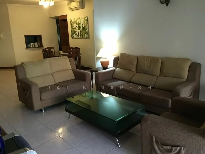 Living features: 2-seater fabric sofa in beige, 3-seater fabric sofa in brown, glass coffee table with green top, laminate flooring, white painted walls, recessed downlights, floor-to-ceiling window, decorative wall sconce, area rug with geometric pattern, wooden dining table visible in background; style: contemporary.