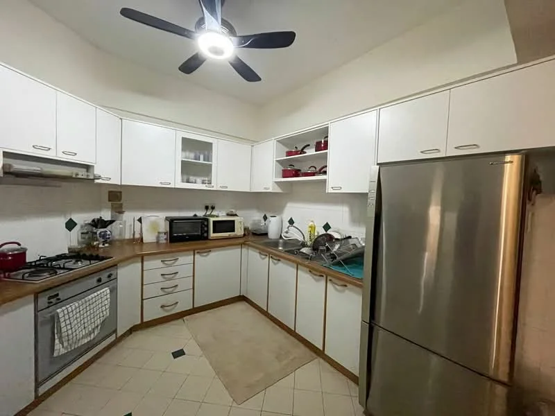 Kitchen features: white cabinetry with flat-panel doors, stainless-steel refrigerator, built-in oven, 4-burner gas hob, microwave, dishwasher, single-bowl stainless-steel sink, chrome pull-down faucet, light-colored countertop, cream tile backsplash, ceiling fan with light, beige area rug, open shelving, decorative items on shelves; style: modern.