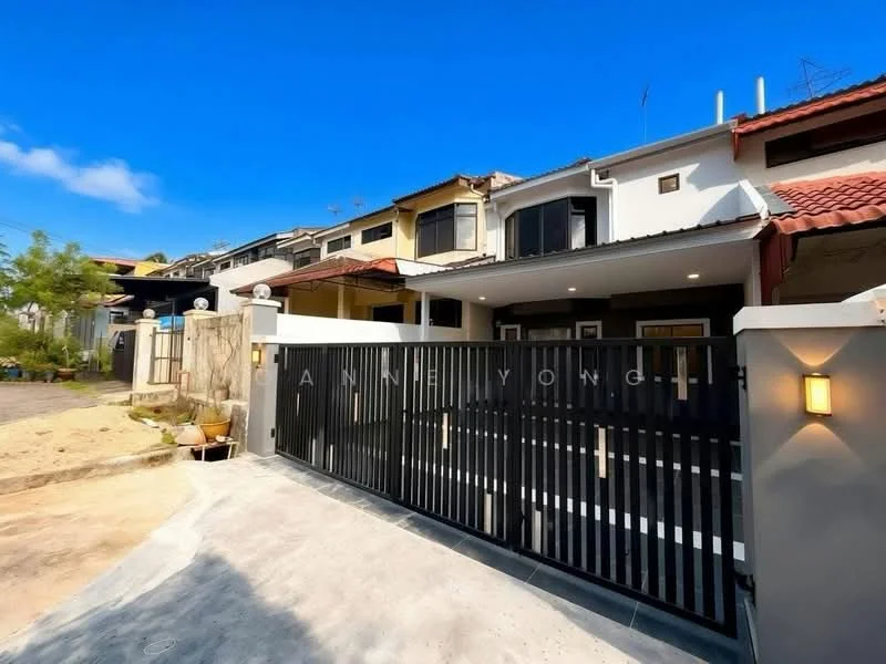 Exterior type: linked terrace house; features: black metal gate, concrete driveway, two-storey building, red tiled roof, white painted facade, front porch area, landscaped garden, mature trees, clear blue sky; style: modern.
