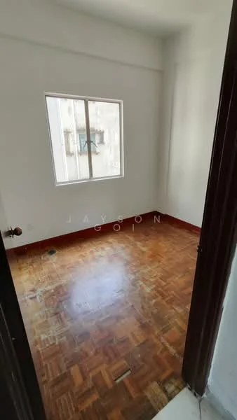 Room features: white painted walls, parquet wood flooring, single window, door frame, baseboard, natural light.