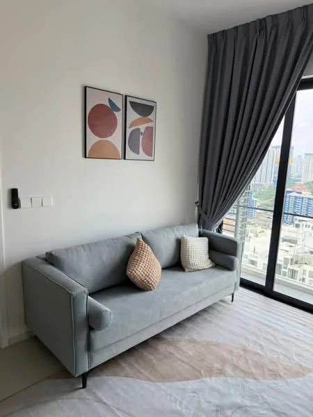 Living features: grey fabric sofa, two decorative cushions, framed artwork on wall, floor-to-ceiling windows, grey curtains, light-colored area rug, white painted walls, light-colored flooring; style: modern; view: city.
