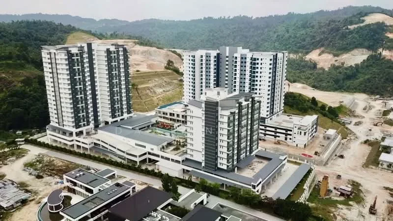 Exterior type: high-rise condominium; features: multiple high-rise buildings, glass curtain wall, balconies on upper floors, landscaped grounds, swimming pool visible, parking deck, surrounding hills, construction site in background, modern architectural design, manicured pathways; style: modern.