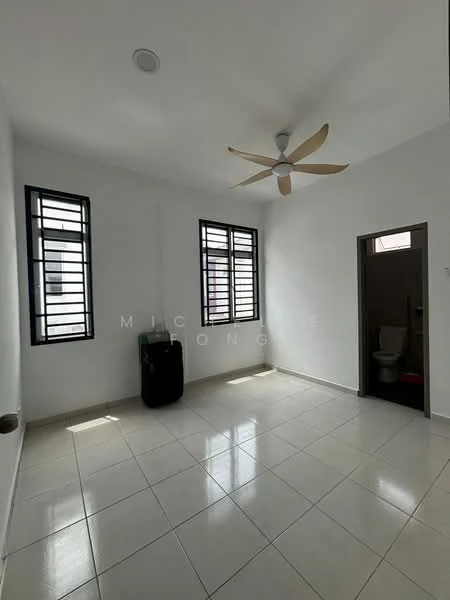 Room features: white painted walls, tile flooring, 5-blade ceiling fan, two casement windows with black frames, door leading to bathroom, one wall-mounted trash bin, natural light from windows; style: modern.