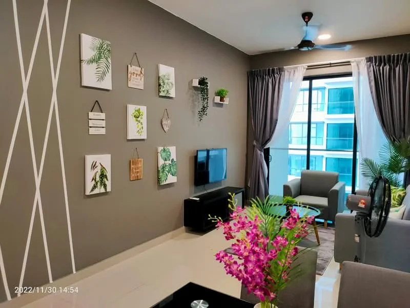Living features: grey painted walls, white ceiling, 5-blade ceiling fan with light, floor-to-ceiling windows, sheer curtains, light grey sofa, armchair in light grey, black TV console, wall-mounted TV, decorative wall art, indoor plants, coffee table, decorative vase with flowers, area rug; style: modern; view: city.