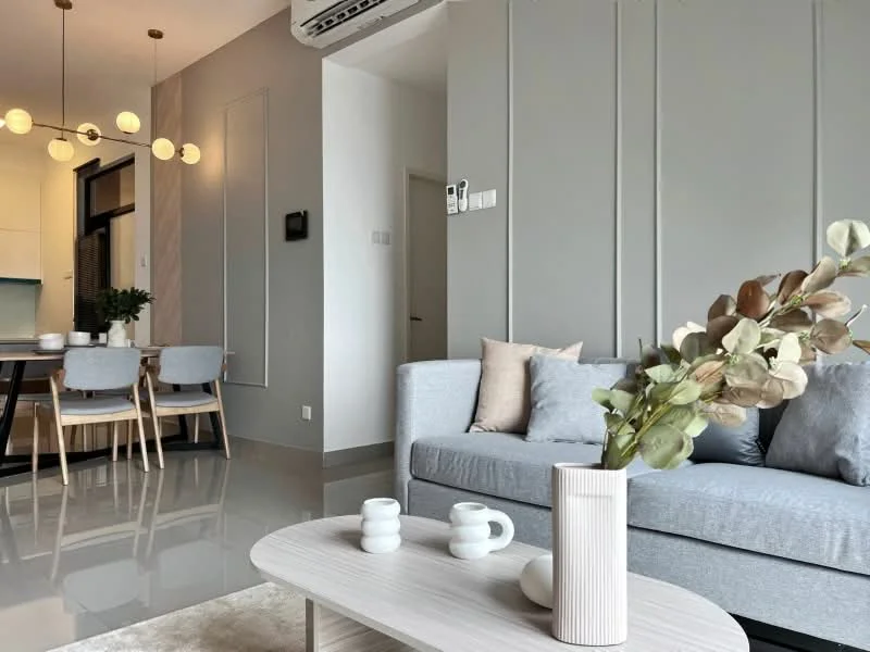Living features: grey fabric sofa, coffee table in light wood, decorative vase with greenery, recessed downlights, wall-mounted split AC, polished tile flooring, neutral wall colour, area rug with light pattern; style: modern. Dining features: 6-seater dining table in light wood, upholstered dining chairs, pendant lighting above dining table; style: modern.