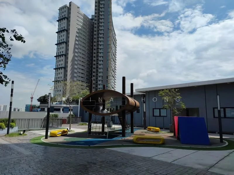 Exterior type: high-rise condominium; features: playground structure with unique design, rubberized flooring, landscaped green area, manicured lawn, surrounding trees, paved walkway, modern high-rise building in background, outdoor play equipment; style: modern.