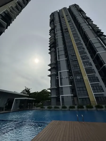 Exterior type: high-rise condominium; features: glass curtain wall, grey painted facade, yellow accent panel, infinity pool, pool deck with wooden flooring, surrounded by landscaped greenery, sunny weather, multiple balconies, modern architectural design; style: modern.