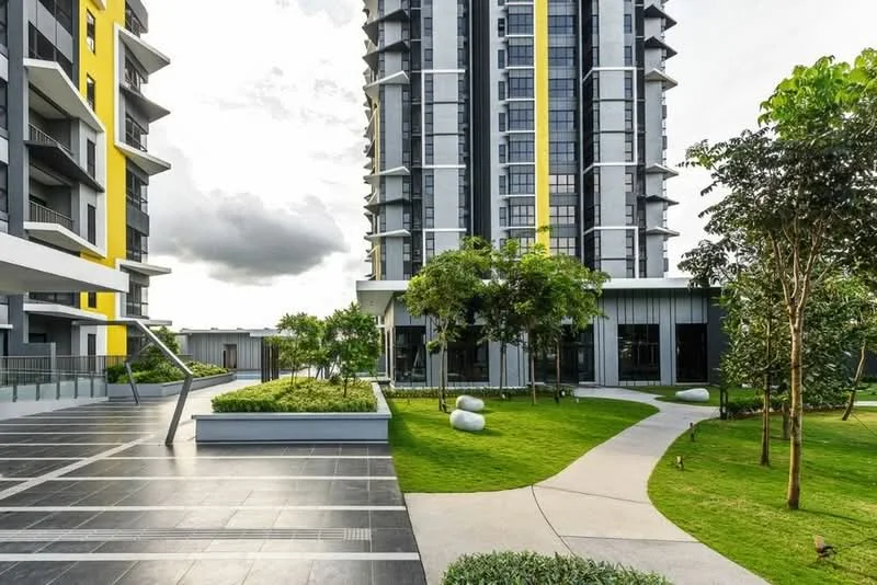 Exterior type: high-rise condominium; features: glass curtain wall, yellow accent panels, manicured lawn, landscape garden, paved walkway, mature trees, outdoor seating area, balconies on upper floors; style: modern.