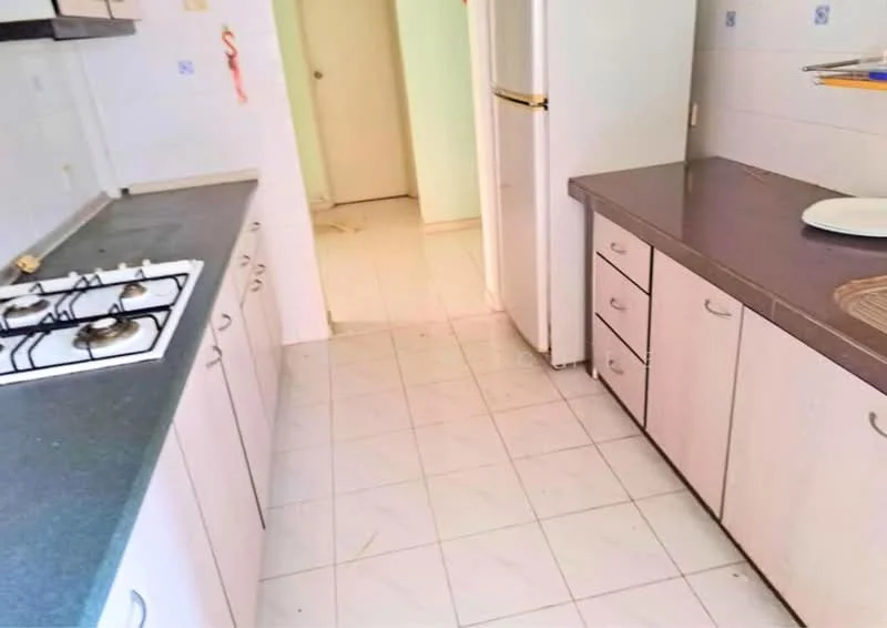 Kitchen features: white laminate cabinetry, grey countertop, gas stove with 4 burners, stainless-steel fridge, double-basin sink, white tiled walls, white tiled flooring, built-in oven, open shelving, kitchen island, wall-mounted cabinets; style: modern.