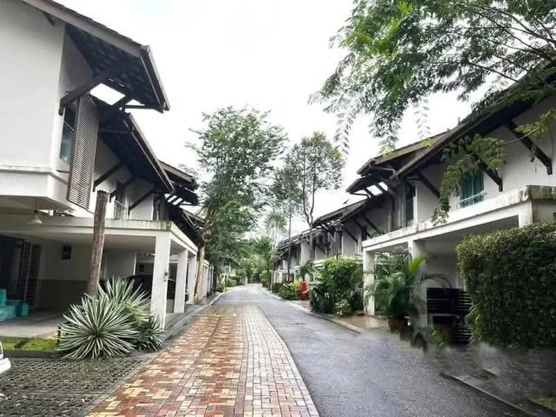 Exterior type: linked terrace house; features: two-storey linked terrace houses, paved walkway, manicured landscaping, mature trees, greenery along the pathway, covered car porches, gabled roofs, exposed wooden beams, front gardens with shrubs, driveway with interlocking pavers; style: modern.