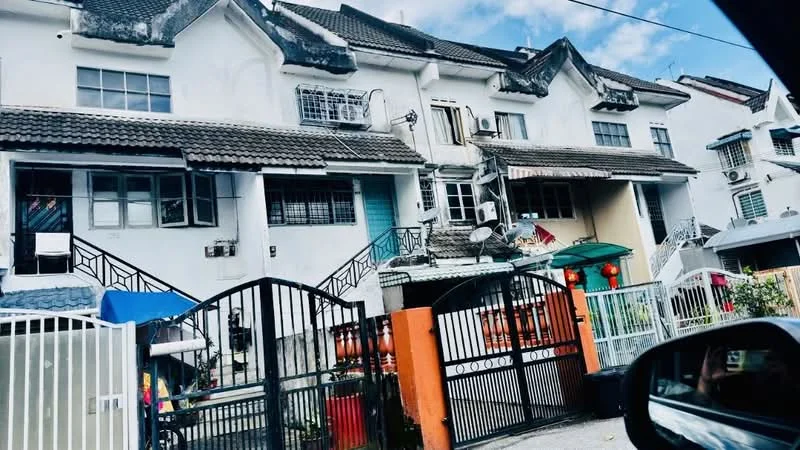 Exterior type: linked terrace house; features: white painted facade, pitched tile roof, multiple air conditioning units visible, balconies with railings, gated entrance, front yard with gate, multiple windows, decorative elements on facade; style: modern.