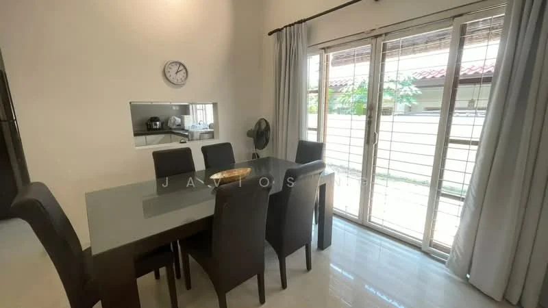Dining features: 6-seater dining table with glass top, upholstered dining chairs in black, wall clock, floor-to-ceiling sliding glass doors, curtains in light grey, light-coloured tiled flooring, ceiling fan, decorative bowl on table; style: modern; view: garden.
