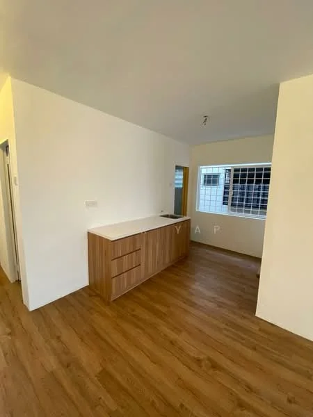 Kitchen features: wooden cabinetry, white countertop, single-bowl stainless-steel sink, window with grid pattern, laminate flooring, neutral painted walls, open layout, kitchen island with storage; style: modern.