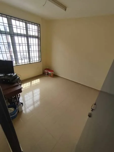Room features: light beige painted walls, glossy ceramic tile flooring, large window with metal grille, wooden desk, computer monitor, plastic storage bins, small stool, natural light from window; style: minimalist; view: city.