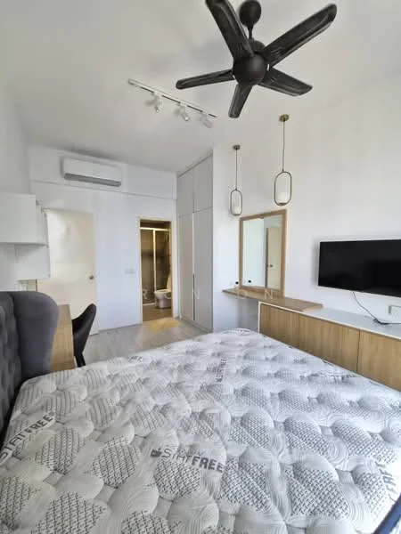 Bedroom features: king-size bed with mattress, grey upholstered headboard, 2 pendant lights, wall-mounted TV, wooden console table, built-in wardrobe with sliding doors, floor-to-ceiling window, 5-blade ceiling fan with light, air conditioning unit, light wood flooring, neutral painted walls, mirror on console table; style: modern. Bathroom features: one-piece toilet, sink with vanity, shower area, tile flooring, neutral wall tiles.