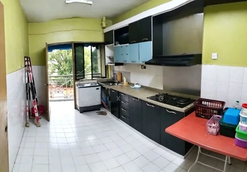Kitchen features: green painted walls, white tiled backsplash, laminate countertop, black cabinetry, blue upper cabinets, stainless-steel sink, 4-burner gas hob, built-in range hood, window with view to balcony, washing machine, red dining table, plastic storage containers, open shelving, floor tiles, sliding glass door to balcony; style: modern; view: garden.