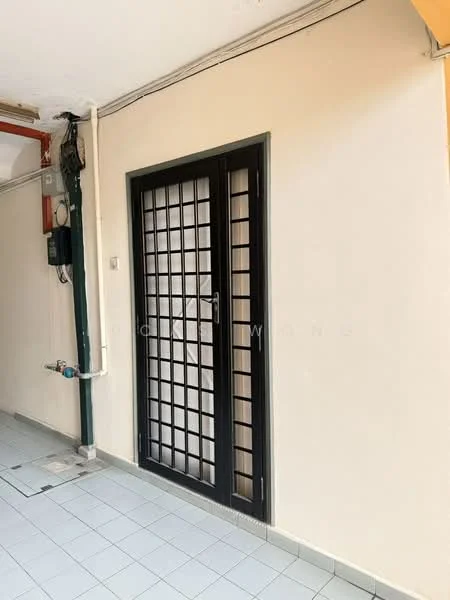 Room features: black framed double doors with grid pattern, cream painted walls, light grey tiled flooring, visible electrical panel, plumbing fixtures on wall; style: modern.