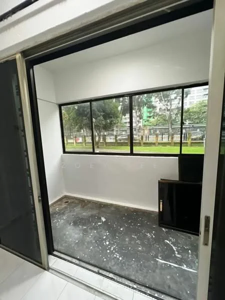 Room features: floor-to-ceiling windows, white painted walls, unfinished flooring, sliding glass door, view of greenery outside; view: garden.