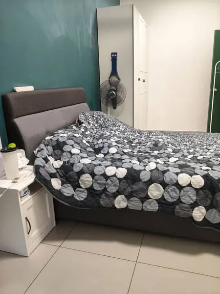 Bedroom features: king-size bed with grey upholstered headboard, bedding with circular pattern in blue and white, white bedside table, table lamp on bedside table, wall-mounted fan, green accent wall, grey tiled flooring, built-in wardrobe in white; style: modern.