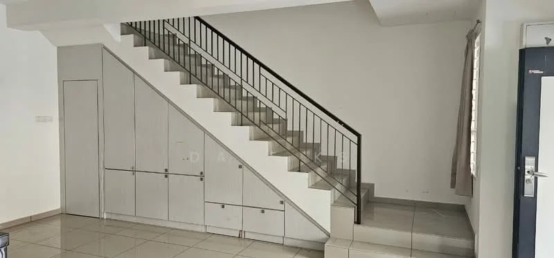 Room features: staircase with metal railing, white painted walls, grey tiled flooring, built-in storage cabinets under stairs, large window with sheer curtains, door with metal frame, light fixture on ceiling; style: modern.