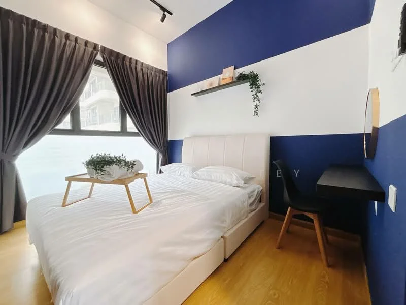 Bedroom features: queen-size bed with upholstered headboard, white bedding, wooden bedside table, decorative tray on bed, black study desk, chair at desk, floor-to-ceiling windows, grey curtains, blue accent wall, white painted walls, wooden flooring, shelf with decorative items; style: modern.