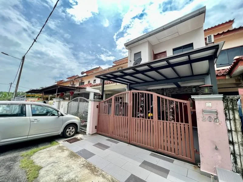Exterior type: linked terrace house; features: brown wooden gate, car porch with awning, two-storey structure, red tiled roof, white painted facade, front garden area, paved driveway, surrounded by residential buildings, visible air conditioning unit, decorative wrought iron details; style: modern.