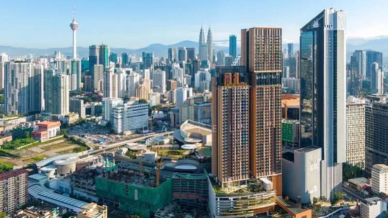 Exterior type: high-rise condominium; features: glass curtain wall, recessed balconies, vertical fins, feature lighting at night, approximately 30-storey high-rise, surrounded by urban skyline, manicured landscaping, adjacent to commercial area; style: modern.