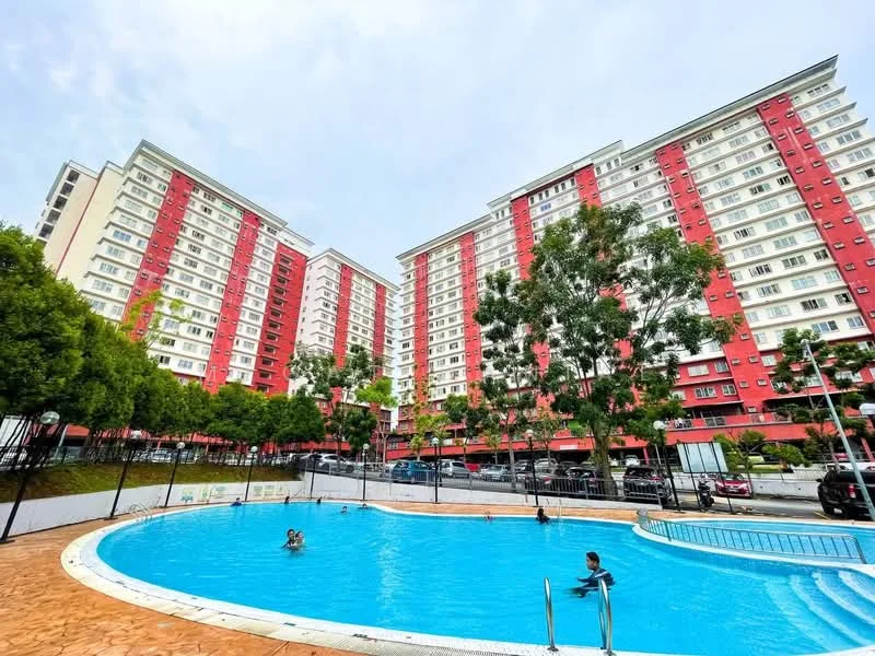 Exterior type: high-rise condominium; features: red and white facade, multiple storeys, swimming pool, surrounding greenery, outdoor seating area, parking area, landscaped garden, children playing in pool; style: modern.