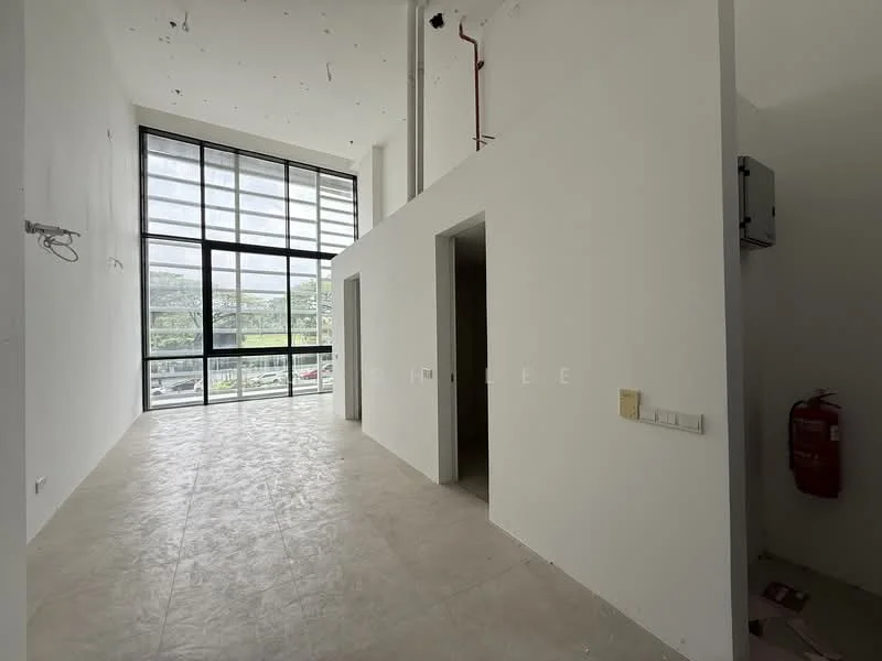 Room features: large floor-to-ceiling windows, white painted walls, concrete flooring, high ceiling, exposed ductwork, fire extinguisher mounted on wall, light fixtures installed on ceiling, open layout; style: modern; view: garden.