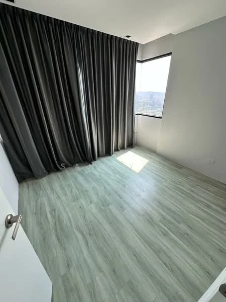 Room features: large floor-to-ceiling window, grey curtains, light grey painted walls, laminate flooring in light wood finish, corner room with natural light, minimalist design, no visible furniture; style: modern; view: city.