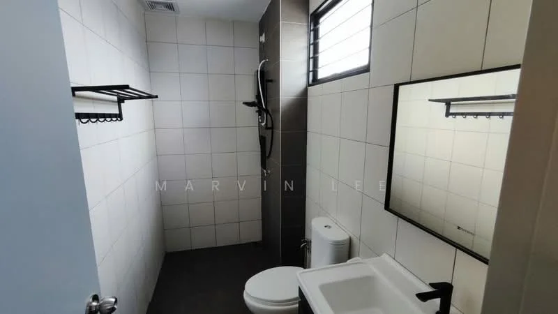 Bathroom features: white tiled walls, grey tiled flooring, walk-in shower with glass partition, chrome shower head, wall-mounted shower controls, single-sink vanity with white cabinet, mirror above sink, one-piece toilet, towel rack, window for natural light; style: modern.