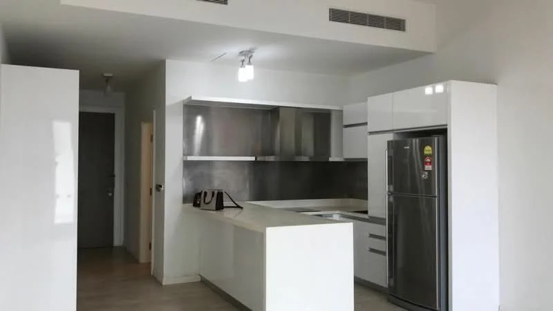Kitchen features: white cabinetry, stainless-steel appliances, stainless-steel fridge, white countertop, grey backsplash, single-bowl stainless-steel sink, chrome pull-down faucet, open layout, recessed downlights, wood-look laminate flooring, island counter, modern design; style: modern. Room features: light fixture, open space, neutral wall color.