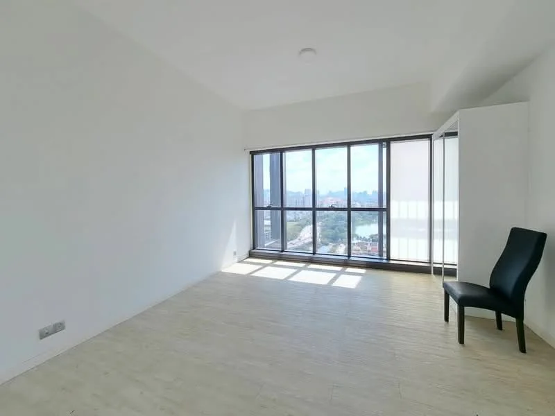 Room features: white painted walls, light wood flooring, floor-to-ceiling windows, black upholstered chair, natural light from windows, city skyline view; style: modern; view: city.